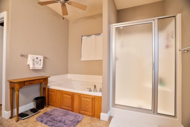 Elegant and expansive 5-bedroom, 3-bathroom home nestled in the on Ledgestone Country Club and Golf Course in Missouri - for sale on GolfHomes.com, golf home, golf lot