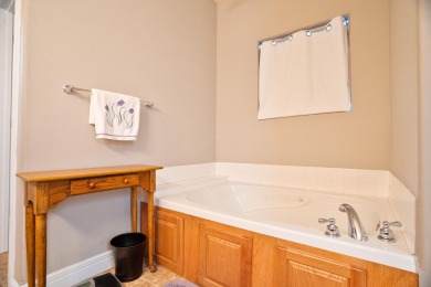 Elegant and expansive 5-bedroom, 3-bathroom home nestled in the on Ledgestone Country Club and Golf Course in Missouri - for sale on GolfHomes.com, golf home, golf lot