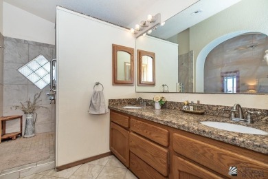 Nestled in the exclusive community of The Dunes, this beautiful on Desert Hills Golf Course in Arizona - for sale on GolfHomes.com, golf home, golf lot