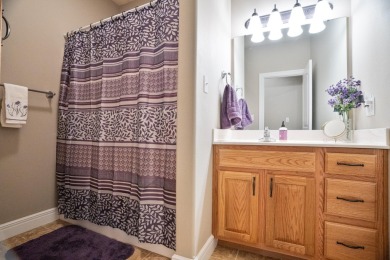 Elegant and expansive 5-bedroom, 3-bathroom home nestled in the on Ledgestone Country Club and Golf Course in Missouri - for sale on GolfHomes.com, golf home, golf lot