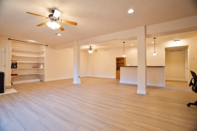 Elegant and expansive 5-bedroom, 3-bathroom home nestled in the on Ledgestone Country Club and Golf Course in Missouri - for sale on GolfHomes.com, golf home, golf lot