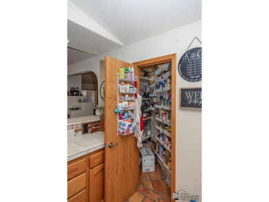 Nestled in the exclusive community of The Dunes, this beautiful on Desert Hills Golf Course in Arizona - for sale on GolfHomes.com, golf home, golf lot
