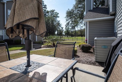 This METICULOUSLY MAINTAINED 3BD, 2.5BA TOWNHOUSE-STYLE CONDO on Surf Golf and Beach Club in South Carolina - for sale on GolfHomes.com, golf home, golf lot