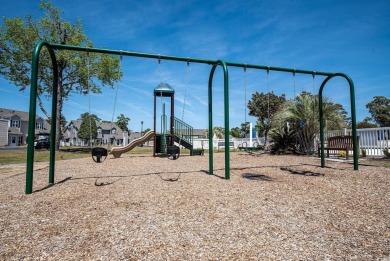 This METICULOUSLY MAINTAINED 3BD, 2.5BA TOWNHOUSE-STYLE CONDO on Surf Golf and Beach Club in South Carolina - for sale on GolfHomes.com, golf home, golf lot