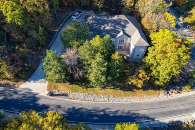 Elegant and expansive 5-bedroom, 3-bathroom home nestled in the on Ledgestone Country Club and Golf Course in Missouri - for sale on GolfHomes.com, golf home, golf lot