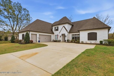Golf course and lake views come together at 387 Caroline Blvd in on Lake Caroline Golf Club in Mississippi - for sale on GolfHomes.com, golf home, golf lot