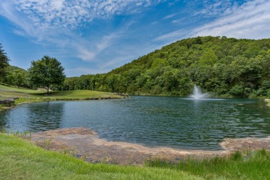 Elegant and expansive 5-bedroom, 3-bathroom home nestled in the on Ledgestone Country Club and Golf Course in Missouri - for sale on GolfHomes.com, golf home, golf lot