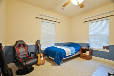 Elegant and expansive 5-bedroom, 3-bathroom home nestled in the on Ledgestone Country Club and Golf Course in Missouri - for sale on GolfHomes.com, golf home, golf lot