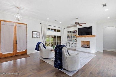 Golf course and lake views come together at 387 Caroline Blvd in on Lake Caroline Golf Club in Mississippi - for sale on GolfHomes.com, golf home, golf lot