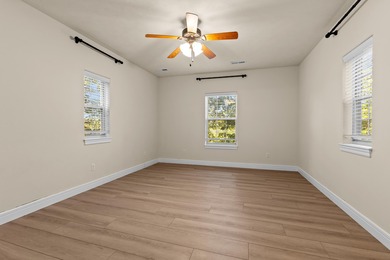 Elegant and expansive 5-bedroom, 3-bathroom home nestled in the on Ledgestone Country Club and Golf Course in Missouri - for sale on GolfHomes.com, golf home, golf lot