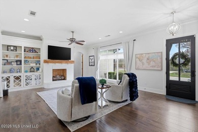 Golf course and lake views come together at 387 Caroline Blvd in on Lake Caroline Golf Club in Mississippi - for sale on GolfHomes.com, golf home, golf lot