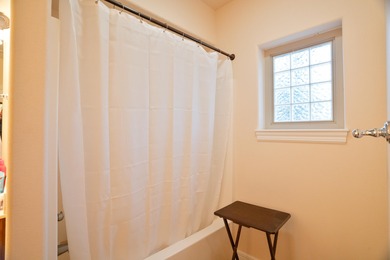 Elegant and expansive 5-bedroom, 3-bathroom home nestled in the on Ledgestone Country Club and Golf Course in Missouri - for sale on GolfHomes.com, golf home, golf lot