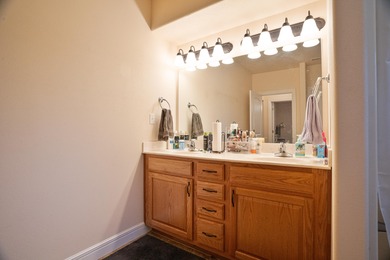 Elegant and expansive 5-bedroom, 3-bathroom home nestled in the on Ledgestone Country Club and Golf Course in Missouri - for sale on GolfHomes.com, golf home, golf lot