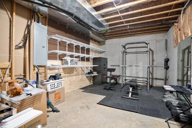 Elegant and expansive 5-bedroom, 3-bathroom home nestled in the on Ledgestone Country Club and Golf Course in Missouri - for sale on GolfHomes.com, golf home, golf lot