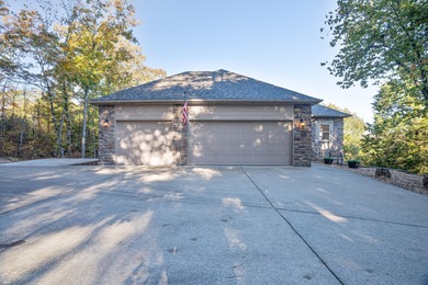 Elegant and expansive 5-bedroom, 3-bathroom home nestled in the on Ledgestone Country Club and Golf Course in Missouri - for sale on GolfHomes.com, golf home, golf lot