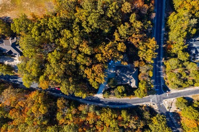 Elegant and expansive 5-bedroom, 3-bathroom home nestled in the on Ledgestone Country Club and Golf Course in Missouri - for sale on GolfHomes.com, golf home, golf lot