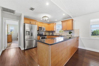 RARE 4 BEDROOM CUSTOM POOL HOME ON A CUL DE SAC in the desirable on Deep Creek Golf Club in Florida - for sale on GolfHomes.com, golf home, golf lot