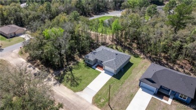 2025 Elegant move in ready home!t New Construction 4 bed/2 bath on Citrus Springs Country Club in Florida - for sale on GolfHomes.com, golf home, golf lot