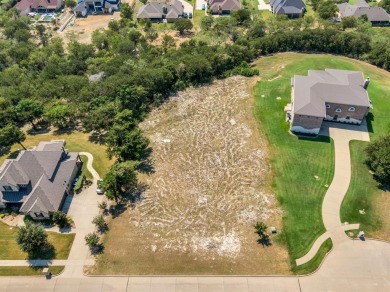 Nestled within the prestigious gated enclave of Lake Ridge in on Tangle Ridge Golf Club in Texas - for sale on GolfHomes.com, golf home, golf lot
