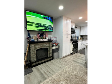 Discover refined living in this completely renovated 2-bedroom on Rivers Edge Golf Course in California - for sale on GolfHomes.com, golf home, golf lot
