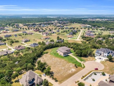 Nestled within the prestigious gated enclave of Lake Ridge in on Tangle Ridge Golf Club in Texas - for sale on GolfHomes.com, golf home, golf lot
