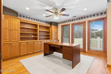 This unique, custom-built home rests on nearly  3/4  of an acre on Lockwood Folly Country Club in North Carolina - for sale on GolfHomes.com, golf home, golf lot