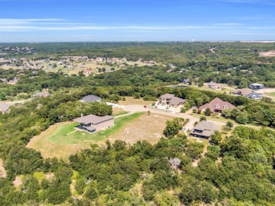 Nestled within the prestigious gated enclave of Lake Ridge in on Tangle Ridge Golf Club in Texas - for sale on GolfHomes.com, golf home, golf lot