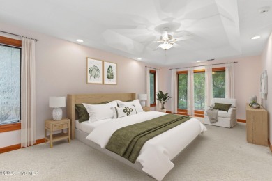This unique, custom-built home rests on nearly  3/4  of an acre on Lockwood Folly Country Club in North Carolina - for sale on GolfHomes.com, golf home, golf lot