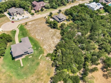 Nestled within the prestigious gated enclave of Lake Ridge in on Tangle Ridge Golf Club in Texas - for sale on GolfHomes.com, golf home, golf lot