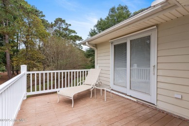 This unique, custom-built home rests on nearly  3/4  of an acre on Lockwood Folly Country Club in North Carolina - for sale on GolfHomes.com, golf home, golf lot