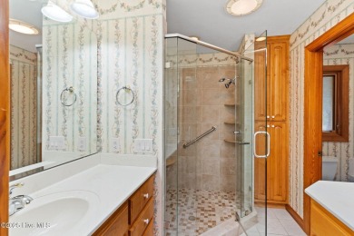 This unique, custom-built home rests on nearly  3/4  of an acre on Lockwood Folly Country Club in North Carolina - for sale on GolfHomes.com, golf home, golf lot