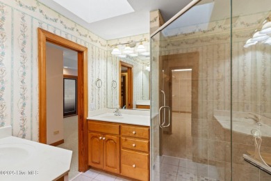 This unique, custom-built home rests on nearly  3/4  of an acre on Lockwood Folly Country Club in North Carolina - for sale on GolfHomes.com, golf home, golf lot