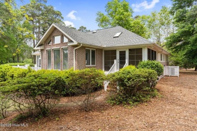 This unique, custom-built home rests on nearly  3/4  of an acre on Lockwood Folly Country Club in North Carolina - for sale on GolfHomes.com, golf home, golf lot