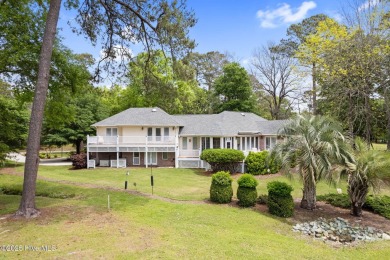 This unique, custom-built home rests on nearly  3/4  of an acre on Lockwood Folly Country Club in North Carolina - for sale on GolfHomes.com, golf home, golf lot