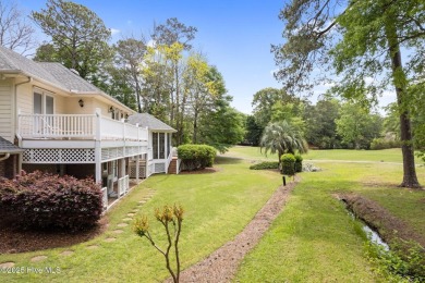 This unique, custom-built home rests on nearly  3/4  of an acre on Lockwood Folly Country Club in North Carolina - for sale on GolfHomes.com, golf home, golf lot