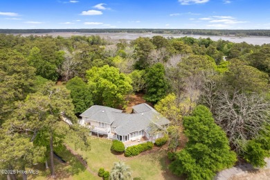 This unique, custom-built home rests on nearly  3/4  of an acre on Lockwood Folly Country Club in North Carolina - for sale on GolfHomes.com, golf home, golf lot