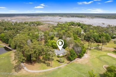 This unique, custom-built home rests on nearly  3/4  of an acre on Lockwood Folly Country Club in North Carolina - for sale on GolfHomes.com, golf home, golf lot
