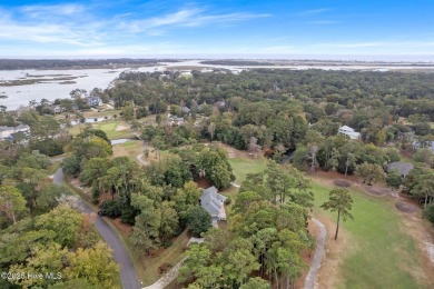 This unique, custom-built home rests on nearly  3/4  of an acre on Lockwood Folly Country Club in North Carolina - for sale on GolfHomes.com, golf home, golf lot