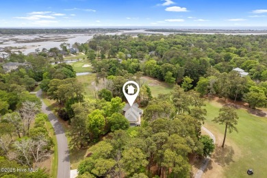 This unique, custom-built home rests on nearly  3/4  of an acre on Lockwood Folly Country Club in North Carolina - for sale on GolfHomes.com, golf home, golf lot