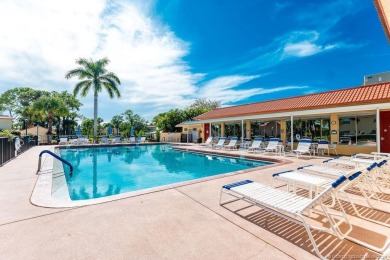 Nestled in a peaceful 55+ community, this 2-bed, 2-bath condo on Monterey Yacht and Country Club in Florida - for sale on GolfHomes.com, golf home, golf lot