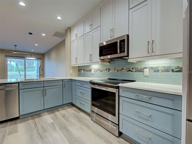 NEW YEAR! NEW HOME! Completely Remodeled Standout Villa with on Pelican Pointe Golf and Country Club in Florida - for sale on GolfHomes.com, golf home, golf lot