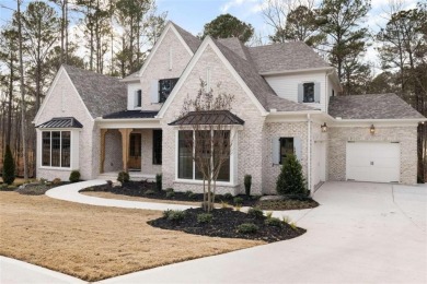 This exquisite home is nestled on the 6th hole of the golf on The Governors Towne Club in Georgia - for sale on GolfHomes.com, golf home, golf lot