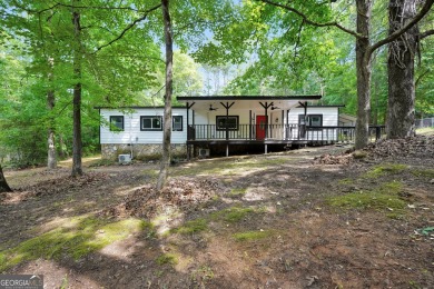 Welcome to 118 Turtle Cove Trwy - a completely renovated on Turtle Cove Golf Course in Georgia - for sale on GolfHomes.com, golf home, golf lot