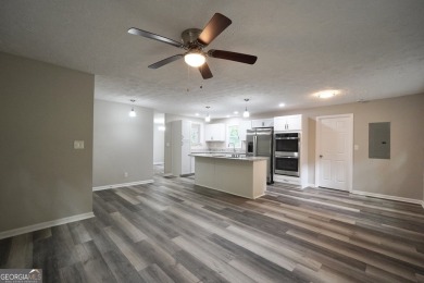 Welcome to 118 Turtle Cove Trwy - a completely renovated on Turtle Cove Golf Course in Georgia - for sale on GolfHomes.com, golf home, golf lot
