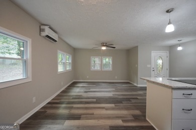 Welcome to 118 Turtle Cove Trwy - a completely renovated on Turtle Cove Golf Course in Georgia - for sale on GolfHomes.com, golf home, golf lot