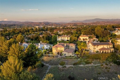Call Listing Agent Holly Thompson, RE/MAX of Santa Clarita for a on Valencia Country Club in California - for sale on GolfHomes.com, golf home, golf lot