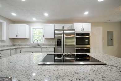 Welcome to 118 Turtle Cove Trwy - a completely renovated on Turtle Cove Golf Course in Georgia - for sale on GolfHomes.com, golf home, golf lot