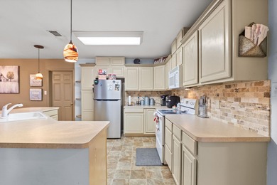 Wake up to lake life done right at this 2 bed, 2 bath home near on Rayburn Country Club in Texas - for sale on GolfHomes.com, golf home, golf lot