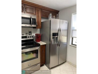 Welcome home to your beautiful turn key condo in the highly on Sunrise Lakes Phase IV Golf Course in Florida - for sale on GolfHomes.com, golf home, golf lot