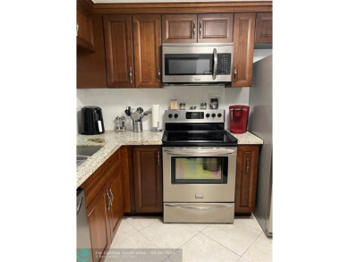 Welcome home to your beautiful turn key condo in the highly on Sunrise Lakes Phase IV Golf Course in Florida - for sale on GolfHomes.com, golf home, golf lot